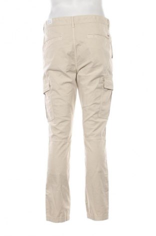 Pantaloni de bărbați Tommy Jeans, Mărime L, Culoare Bej, Preț 529,99 Lei