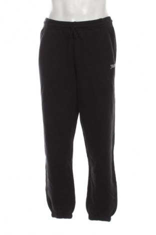 Herren Sporthose Tommy Jeans, Größe M, Farbe Schwarz, Preis 112,99 €