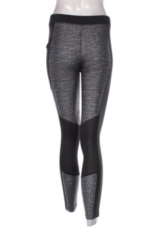 Damskie legginsy Decathlon, Rozmiar M, Kolor Kolorowy, Cena 19,99 zł