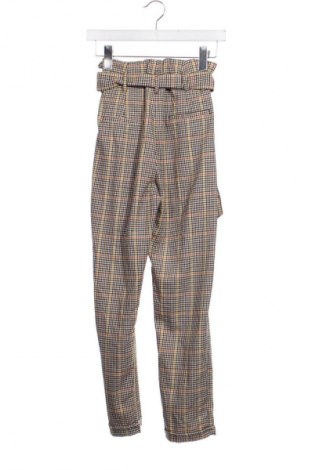 Damskie spodnie Bershka, Rozmiar XXS, Kolor Kolorowy, Cena 20,29 zł