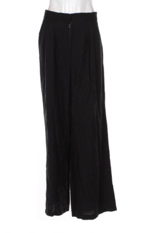 Pantaloni de femei Guido Maria Kretschmer for About You, Mărime XL, Culoare Negru, Preț 132,99 Lei, #134932485