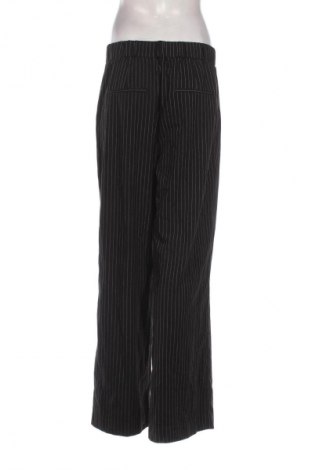 Damskie spodnie Reserved, Rozmiar L, Kolor Kolorowy, Cena 19,99 zł