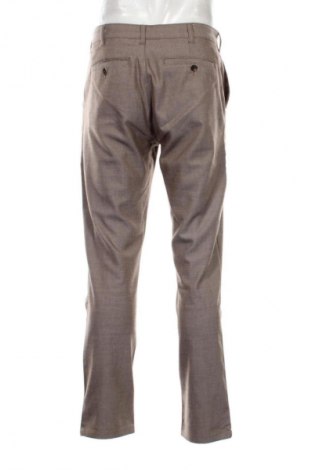 Męskie spodnie LC Waikiki, Rozmiar L, Kolor Beżowy, Cena 56,74 zł